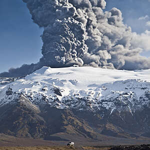 Massive ash plume erupting through 200 meter thick glacial ice sheet at the summit of Eyjafjallajokull volcano.