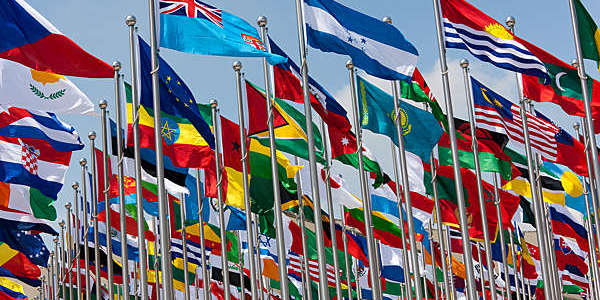 National flags of different countries blowing in the wind.
