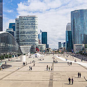 View down the esplanade of La Défense business district in Paris, France.
