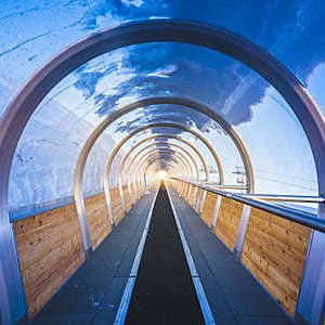 Indoor ski lift tunnel with conveyor belt in the Jungfrau region in Switzerland.